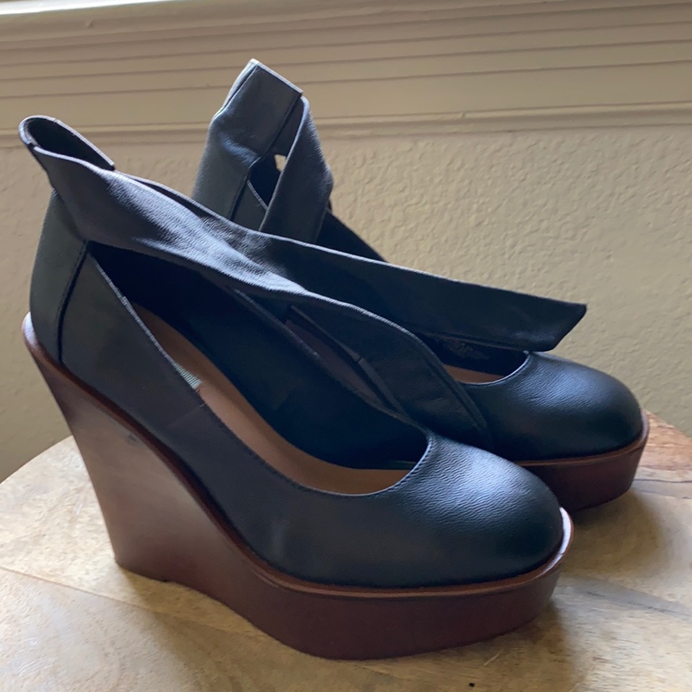 Edgy, ankle-tie wedges in used but good condition.